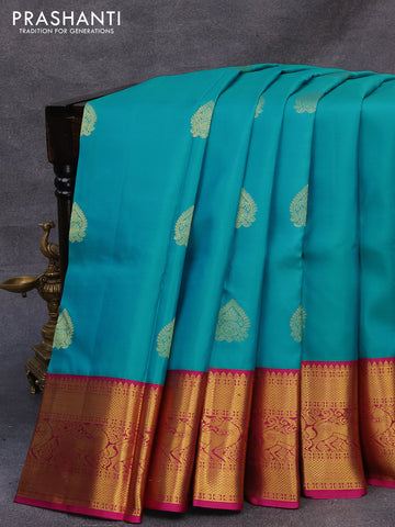 Pure kanjivaram silk saree teal blue and purple with zari woven buttas and long rich zari woven korvai border