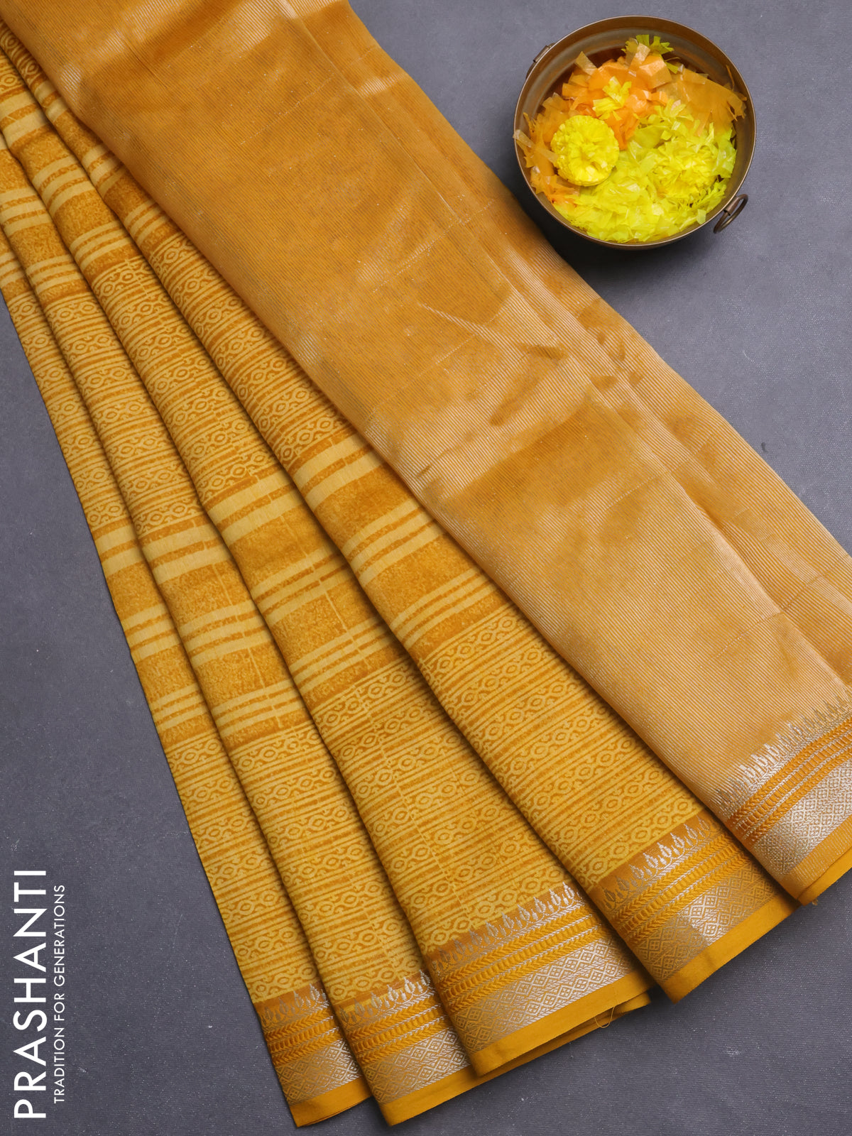 Chanderi silk cotton saree mustard yellow with allover prints and silver zari woven border