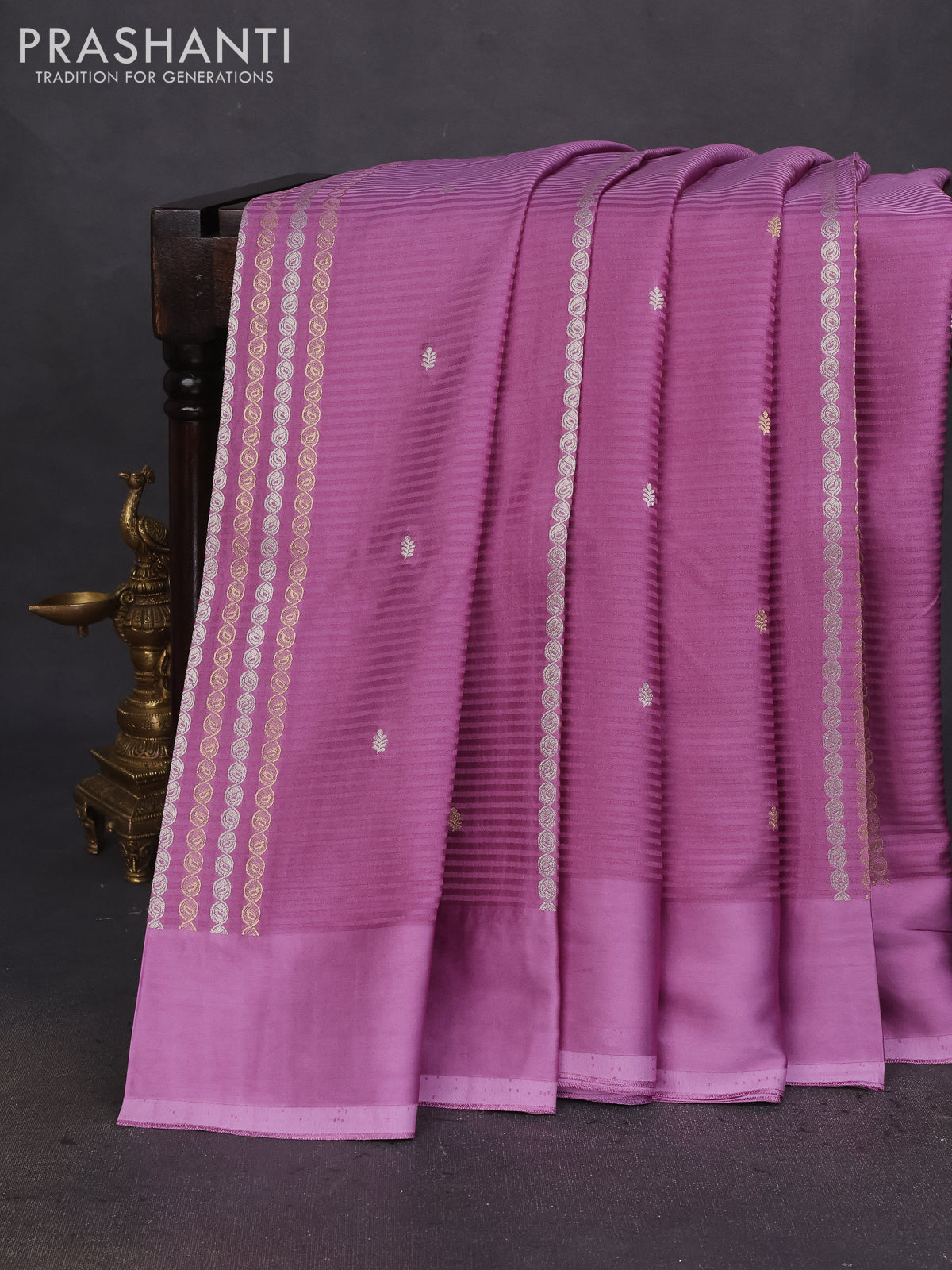 Banarasi mushru silk saree lavender with allover stripes pattern & zari weaves and satin border