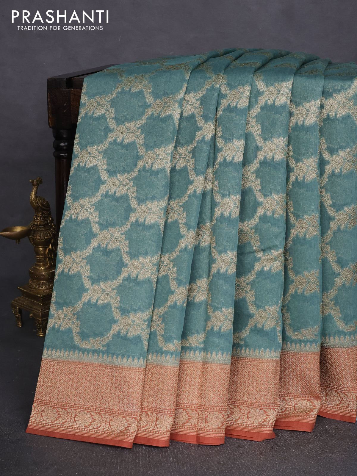 Banarasi silk cotton saree pastel blue and rust shade with allover thread & zari weaves and woven border