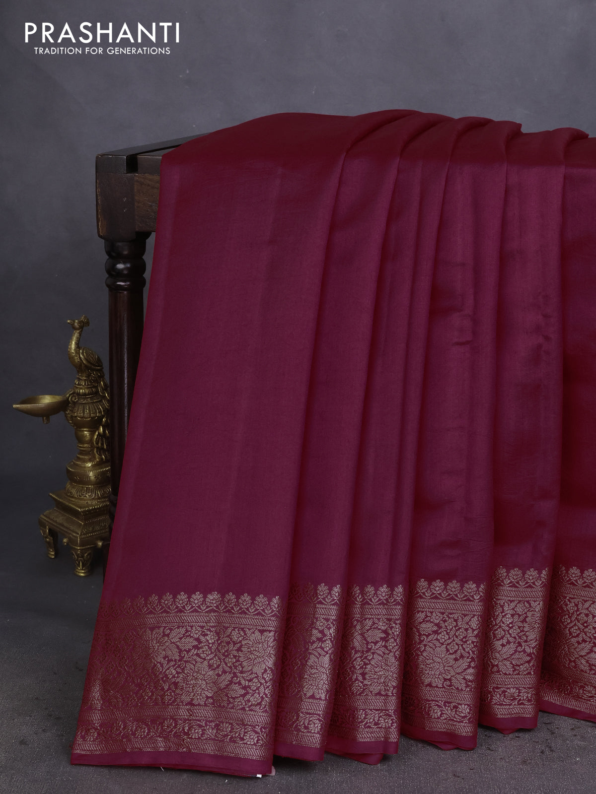 Chiniya silk saree maroon and deep jamun with plain body and woven border
