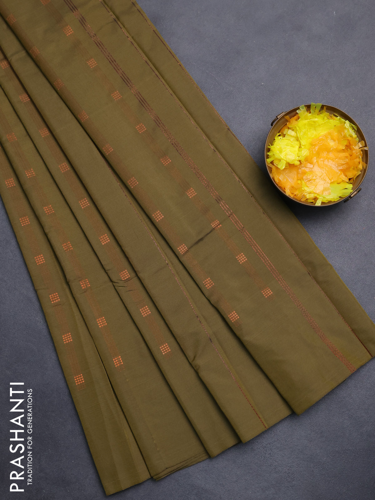 Arani semi silk saree sap green with copper zari woven buttas in borderless style