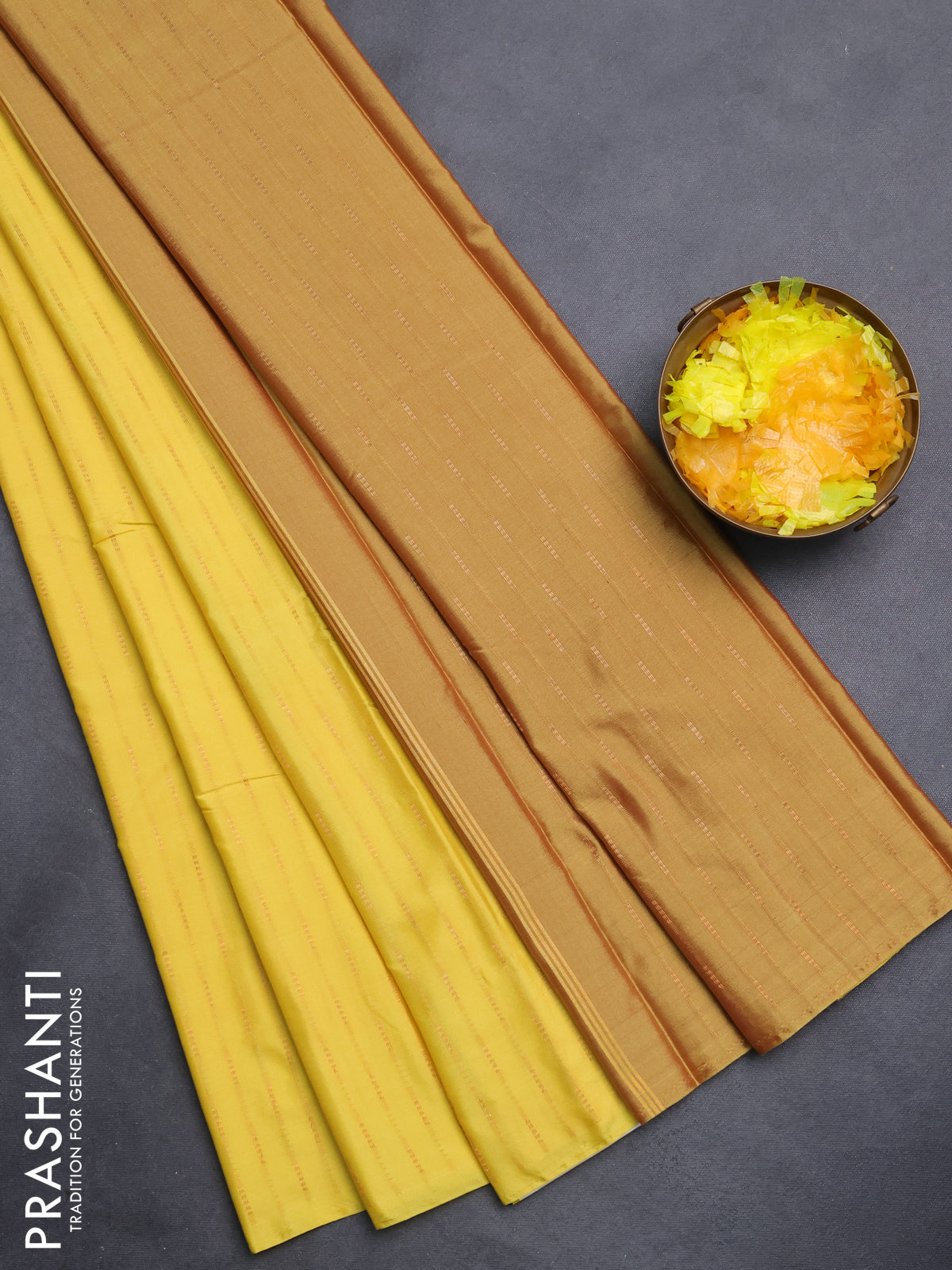 Arani semi silk saree yellow with zari woven buttas in borderless style