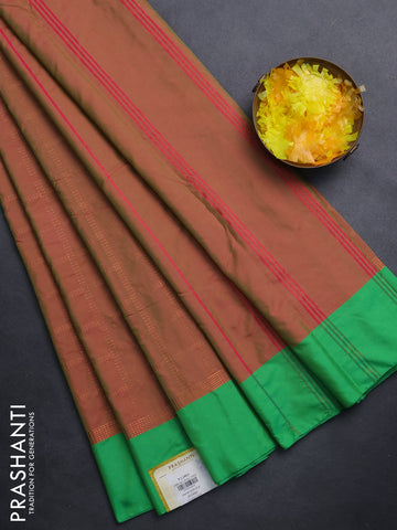 Arani semi silk saree dual shade of pink and green with allover copper zari checked pattern and copper zari woven simple border