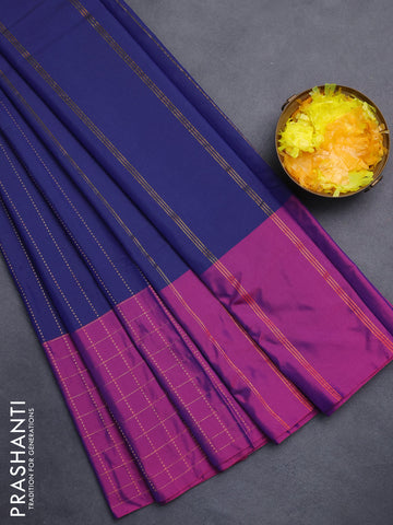 Arani semi silk saree navy blue and purple with allover copper zari weaves and zari checked border