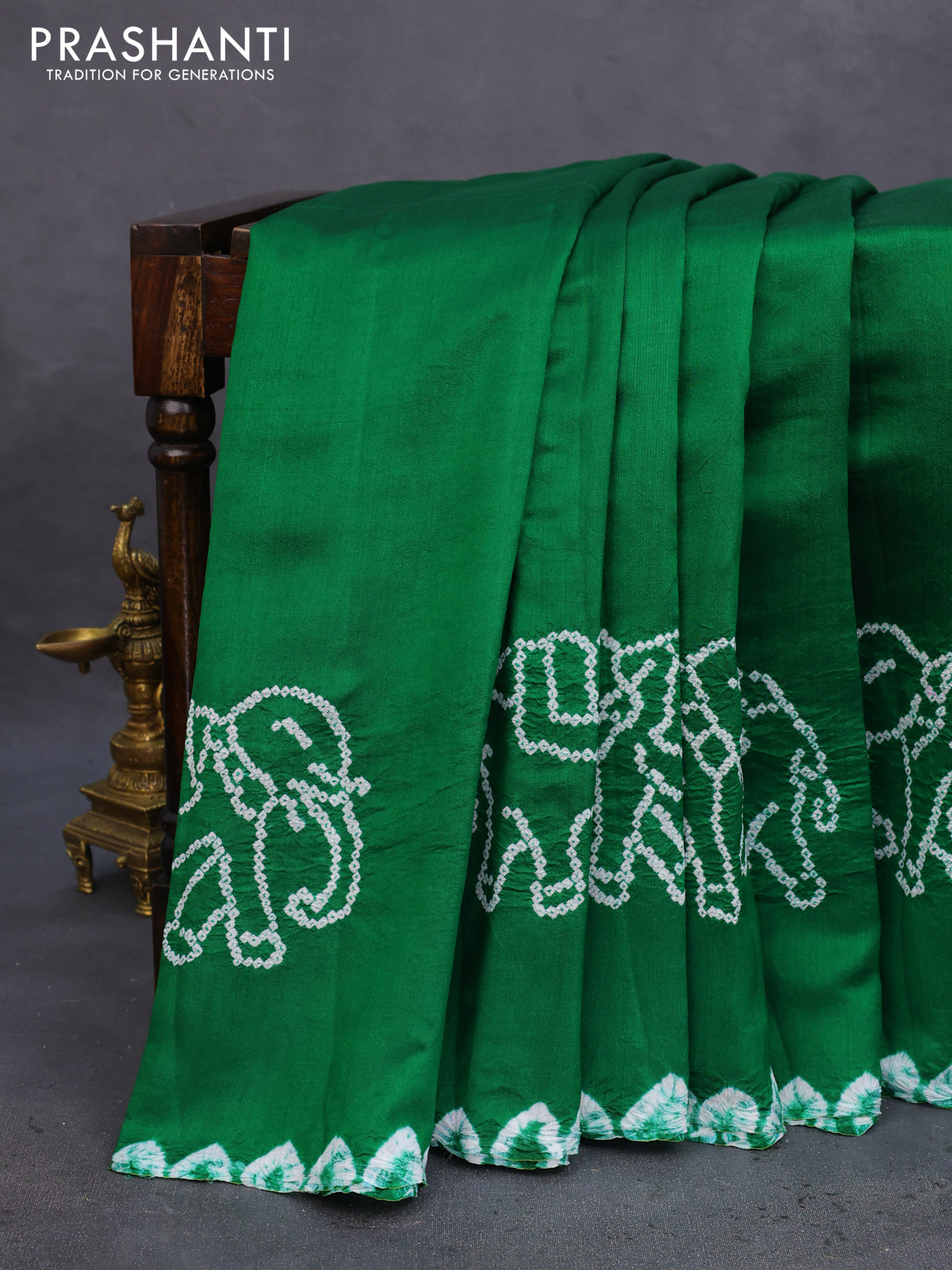 Chiniya silk saree green with allover bandhani prints