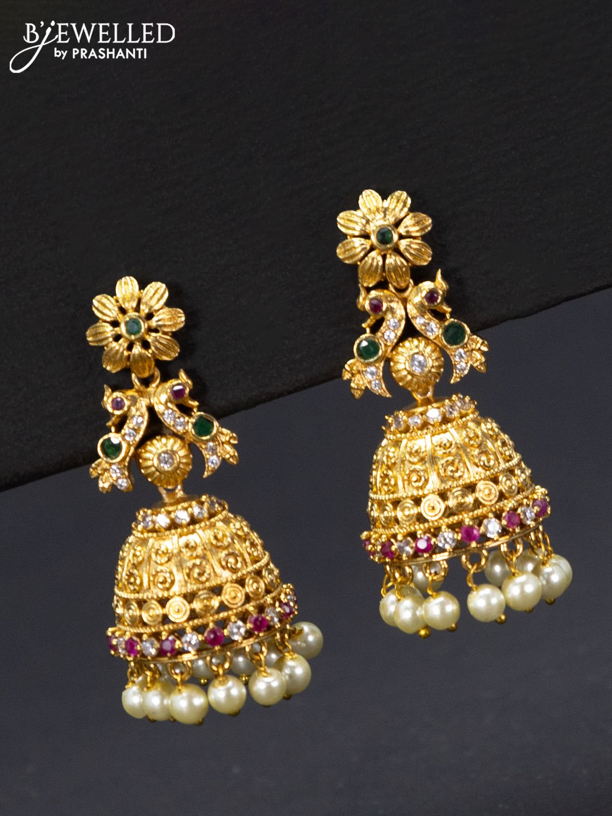 Antique jhumka peacock & floral design with kemp & cz stones and pearl hangings