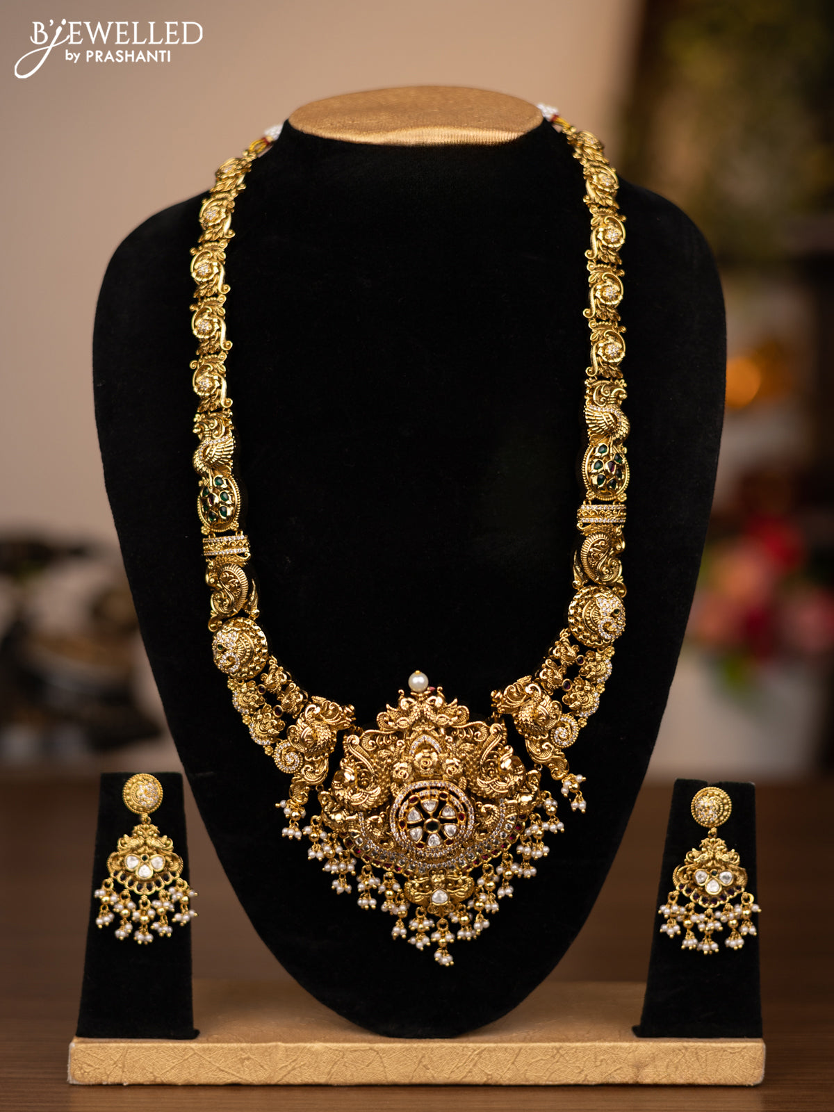 Antique haaram lakshmi design with jadau kundan stones and pearl hangings