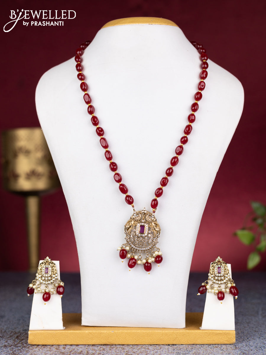 Beaded maroon necklace peacock design with ruby & cz stones and pearl & beads hangings in victorian finish