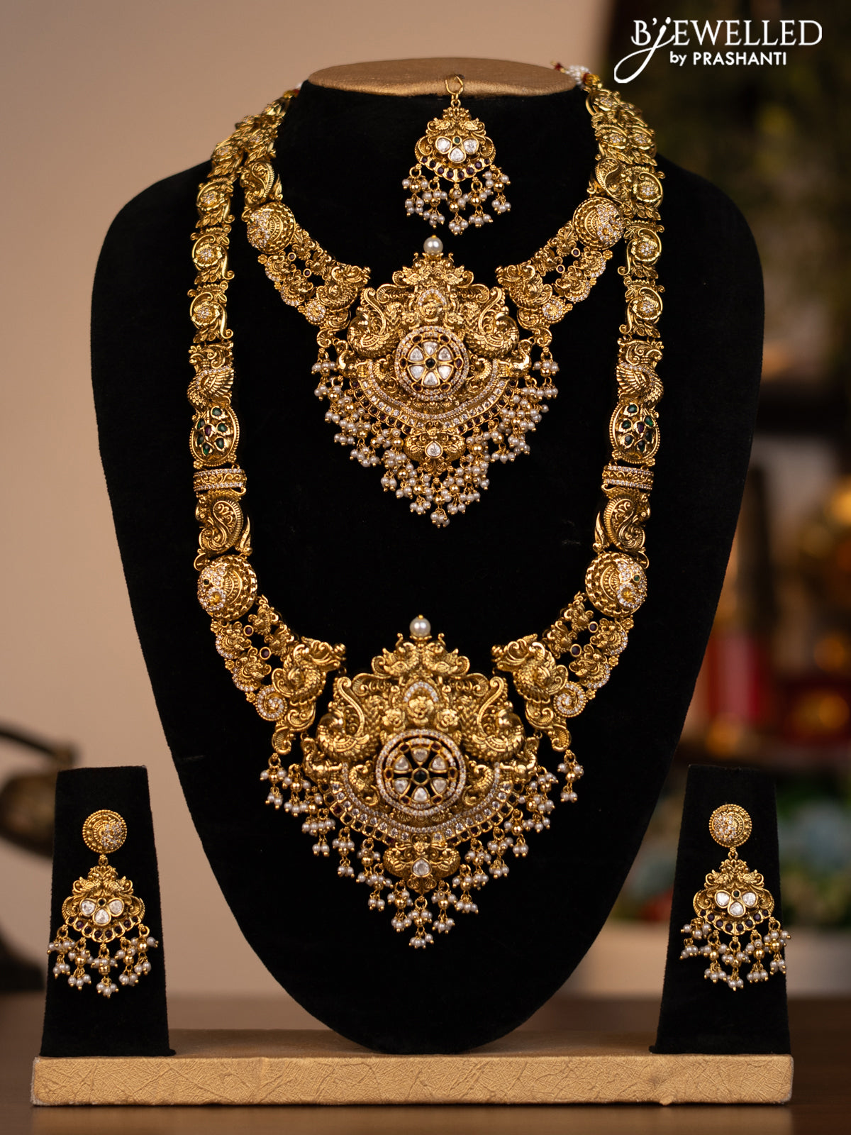 Antique combo set peacock design with jadau kundan stones and pearl & golden beads hanging
