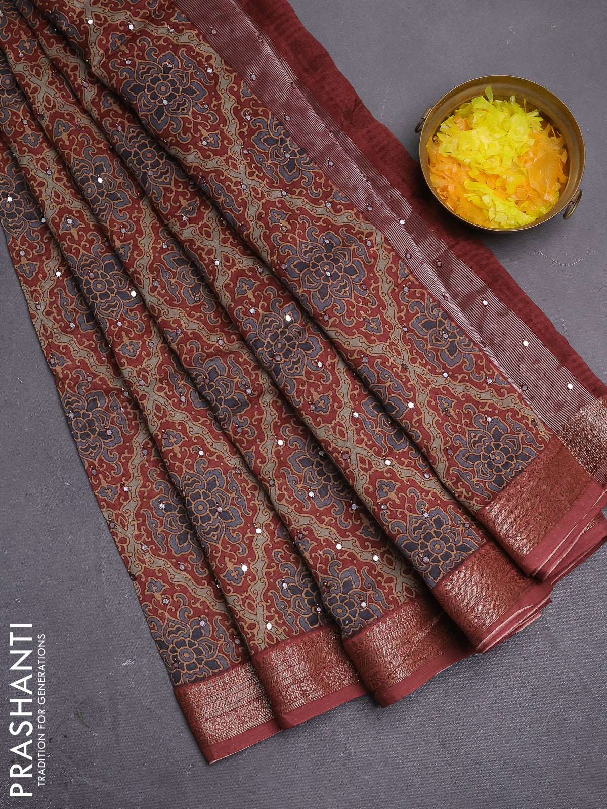 Chanderi silk cotton saree pastel maroon with allover prints & mirror work and woven border