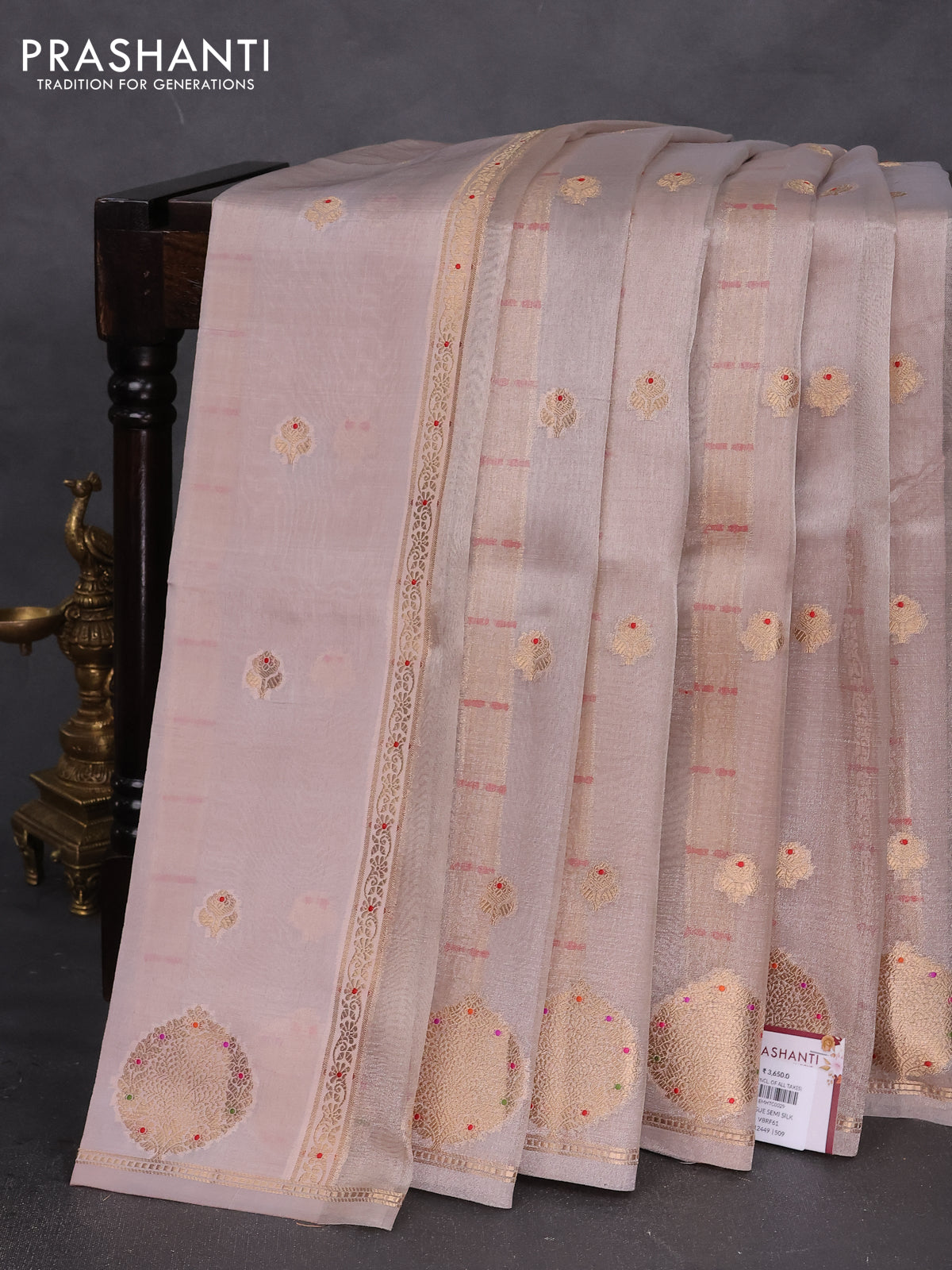 Banarasi tissue semi silk saree pastel peach with zari weaves & buttas and zari woven butta border