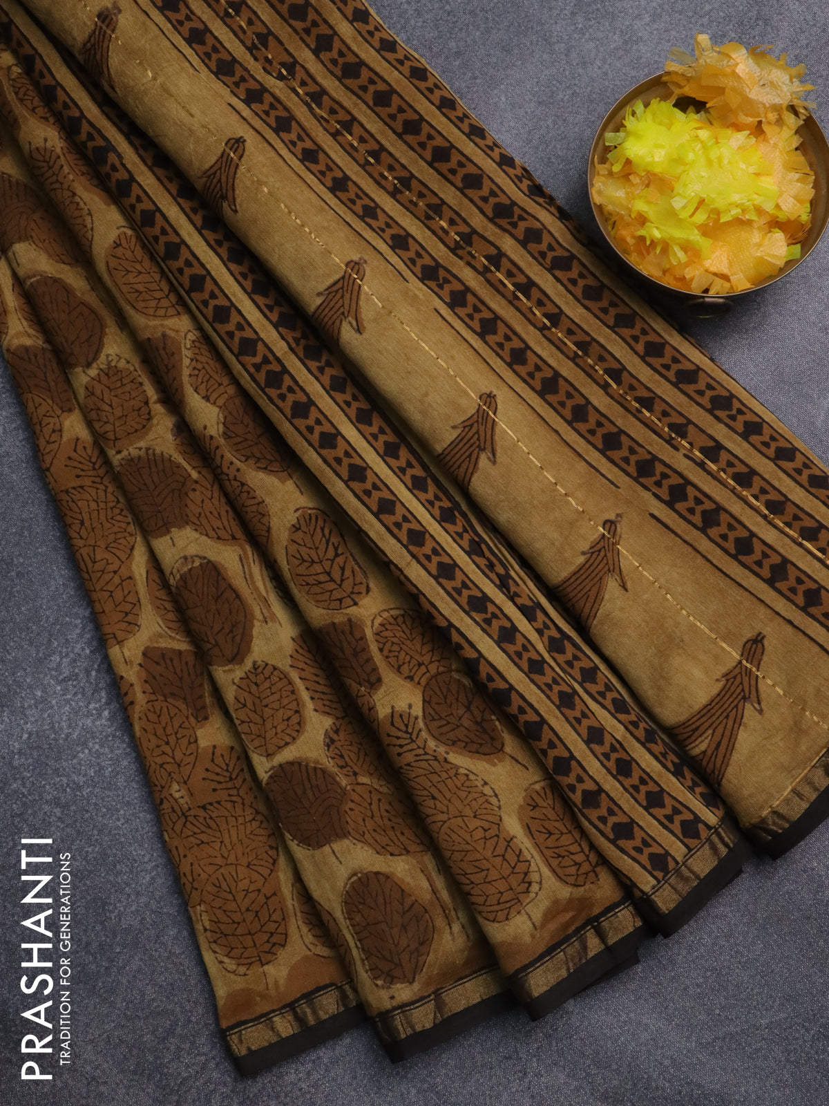 Chanderi bagru saree sandal and brown with allover leaf prints and small zari woven border
