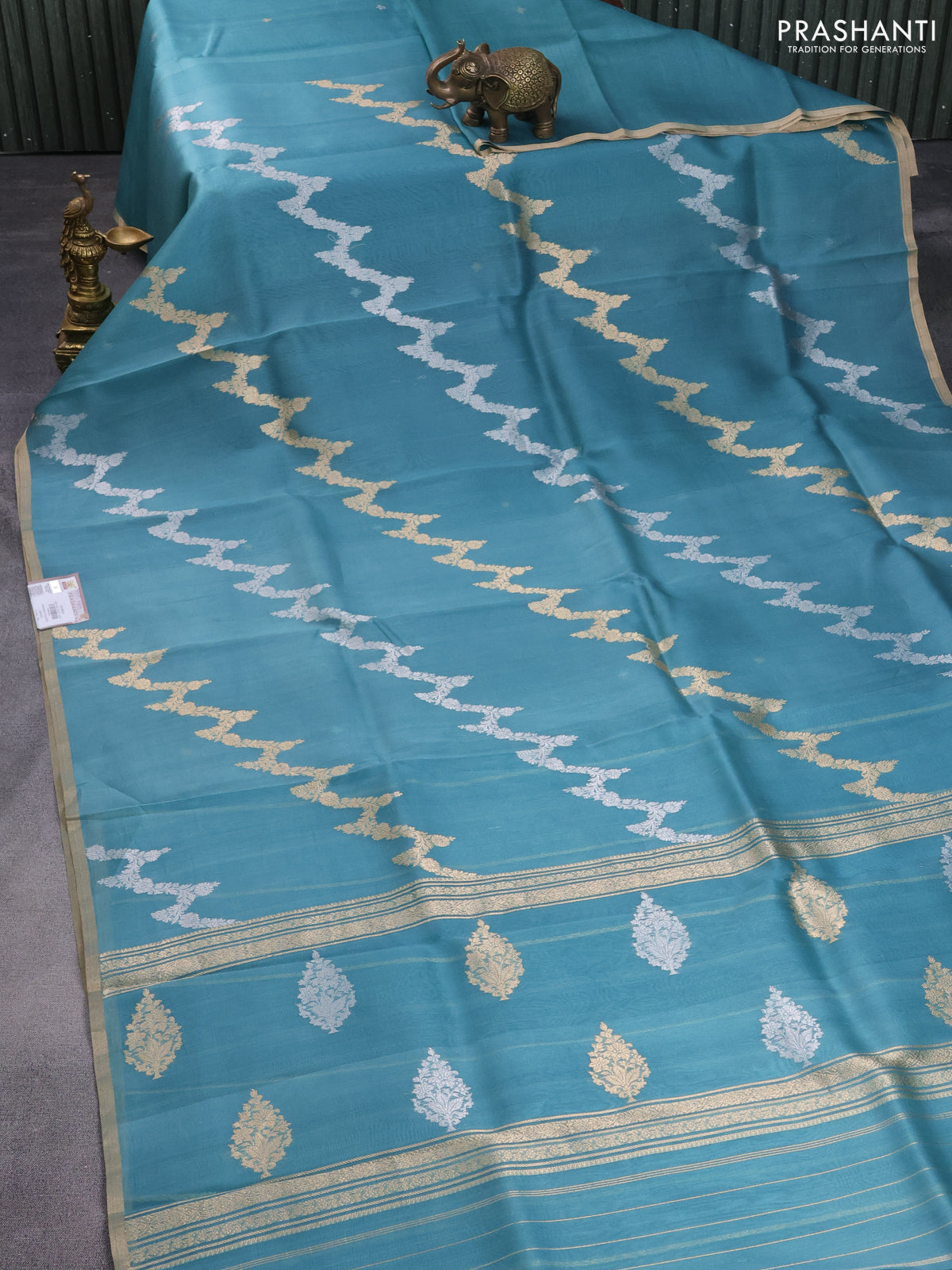 Banarasi organza silk saree pastel blue with silver & gold zari weaves and zari woven piping border