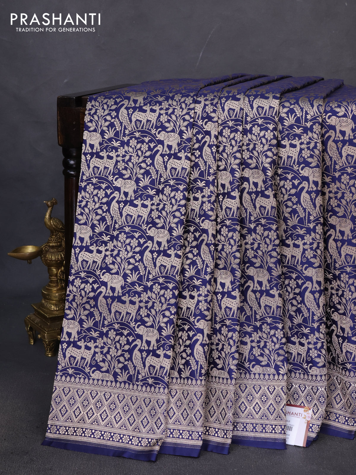 Banarasi semi katan saree navy blue with allover zari woven vanasingaram weaves and zari woven border