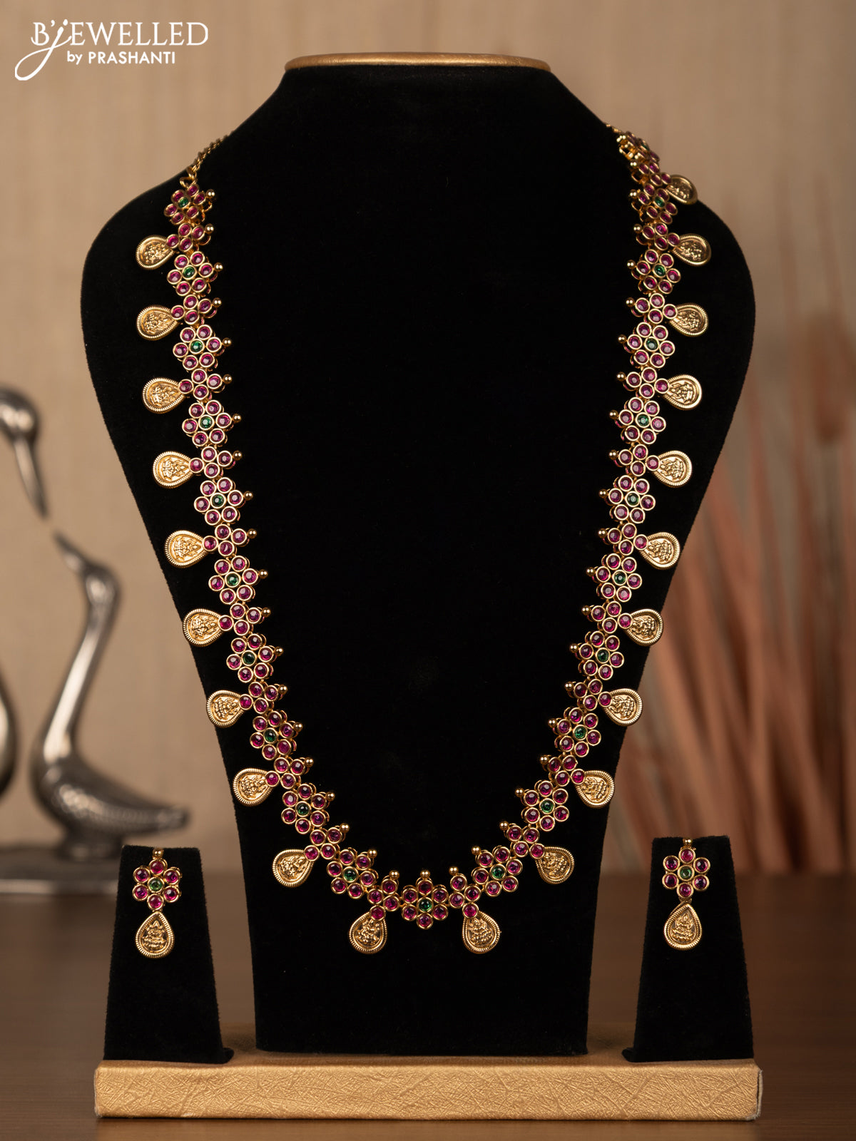 Antique haaram lakshmi design with kemp stones