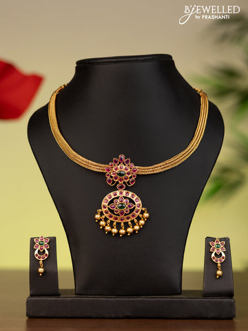 Antique attigai necklace with kemp stones and golden beads hanging