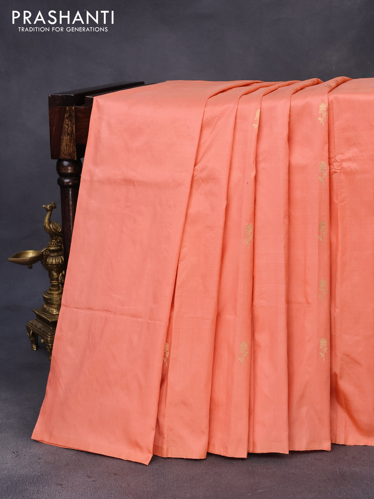 Banarasi katan silk saree peach shade with zari woven buttas in borderless style