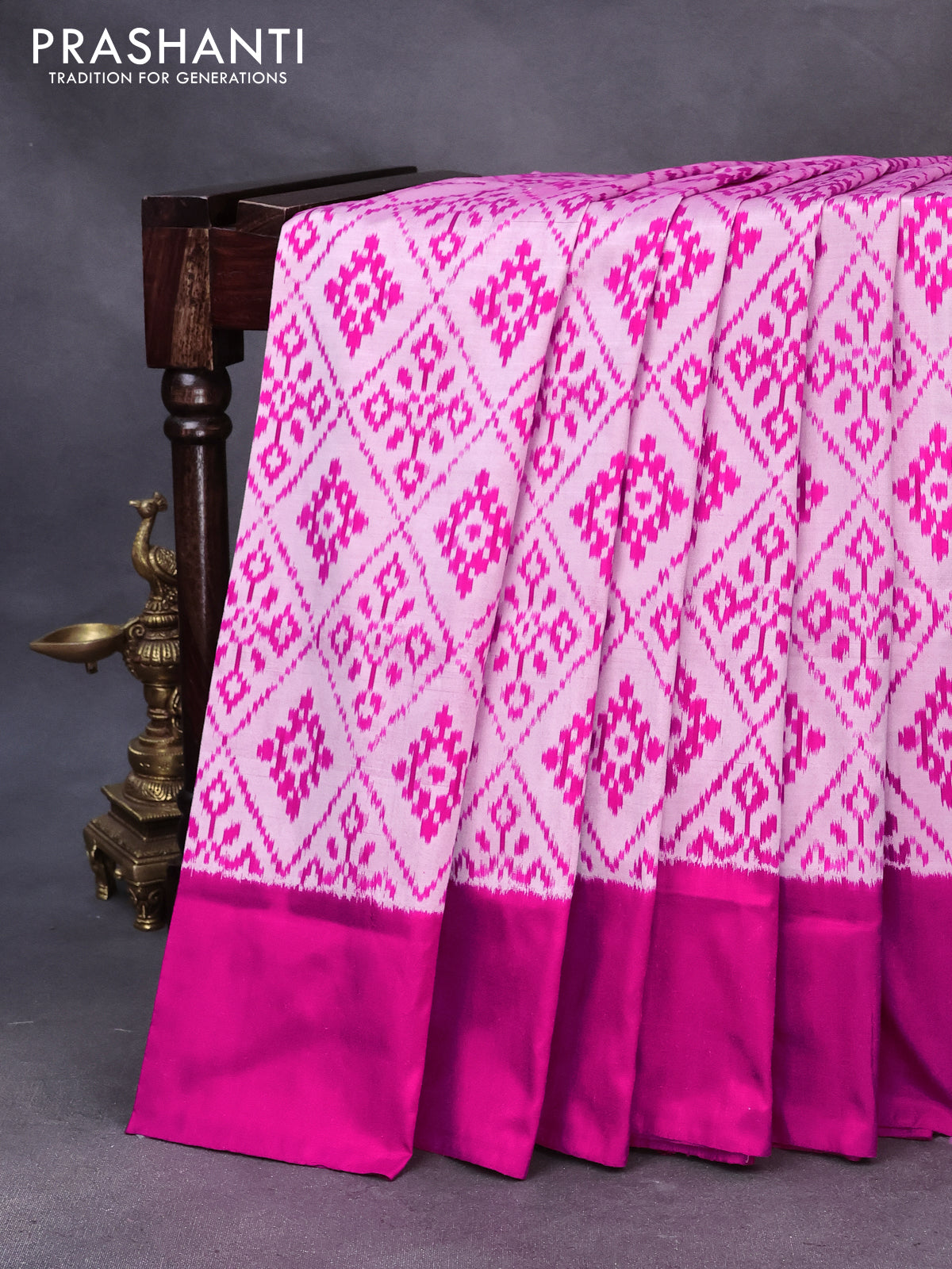 Pochampally silk saree light pink shade and pink with allover ikat weaves and simple border