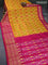 Pochampally silk saree dark mustard yellow and magenta pink with allover ikat weaves and long zari woven border