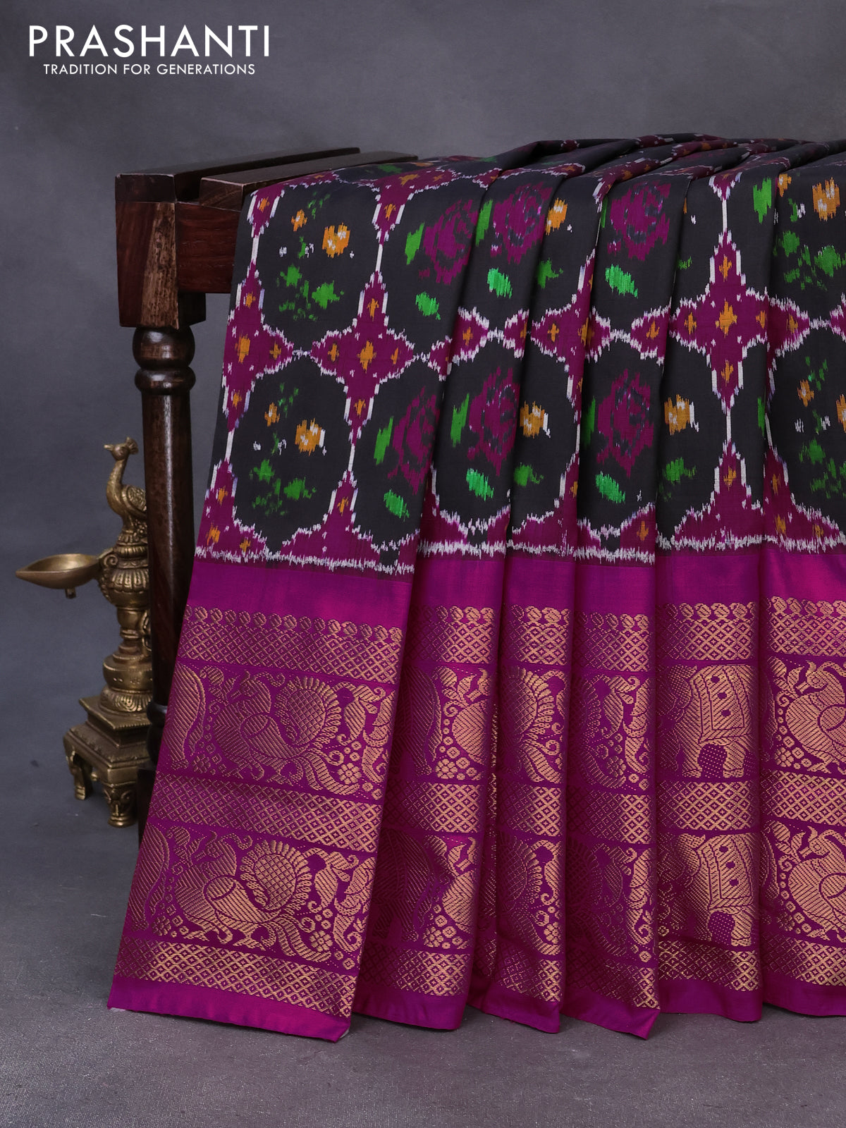 Pochampally silk saree black and pink with allover ikat weaves and long annam & elephant zari woven border