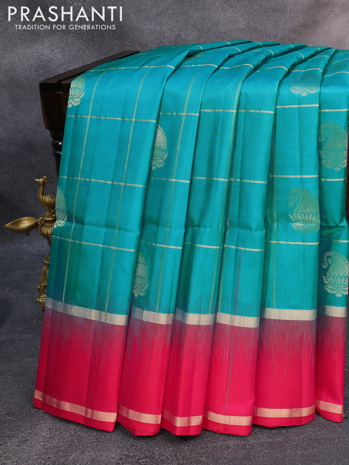 Pure soft silk saree teal blue and pink with allover zari checks & buttas and rettapet zari woven border