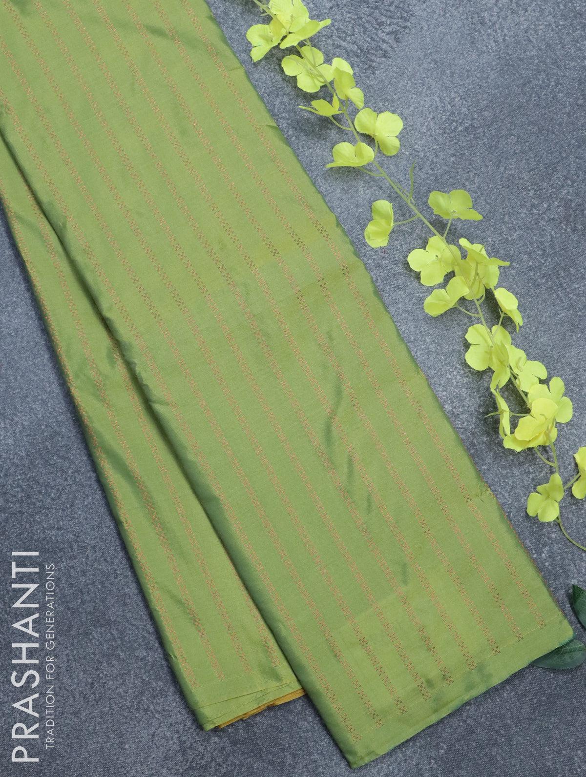 Arani semi silk saree dual shade of green and yellow shade with allover zari weaves in borderless style