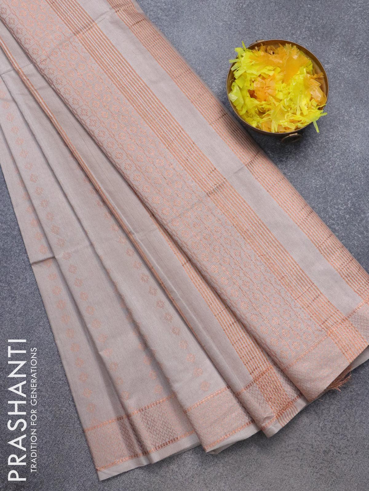 Bamboo silk saree grey shade with allover copper zari woven butta weaves and zari woven border