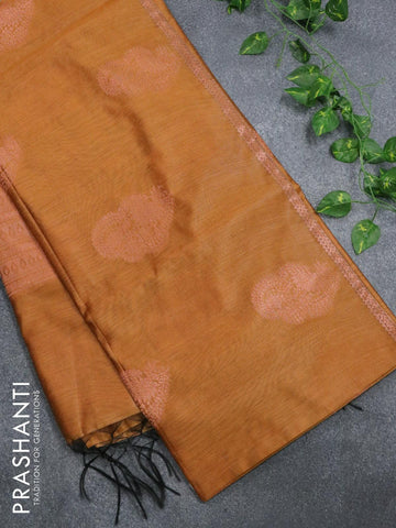 Banarasi cotton saree mustard shade with copper zari woven buttas and piping border