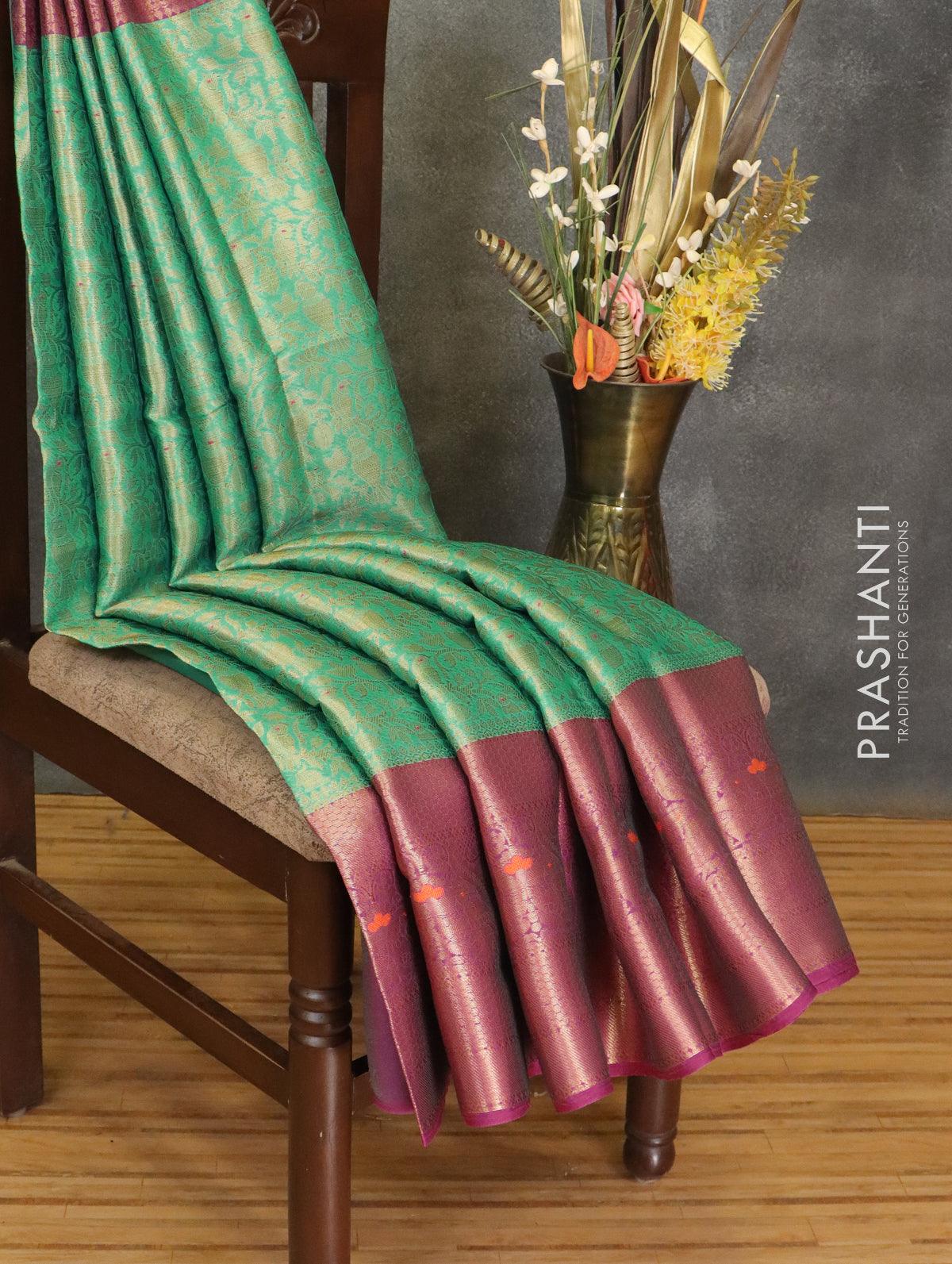 Banarasi kora saree green and purple with allover zari weaves and long zari woven border