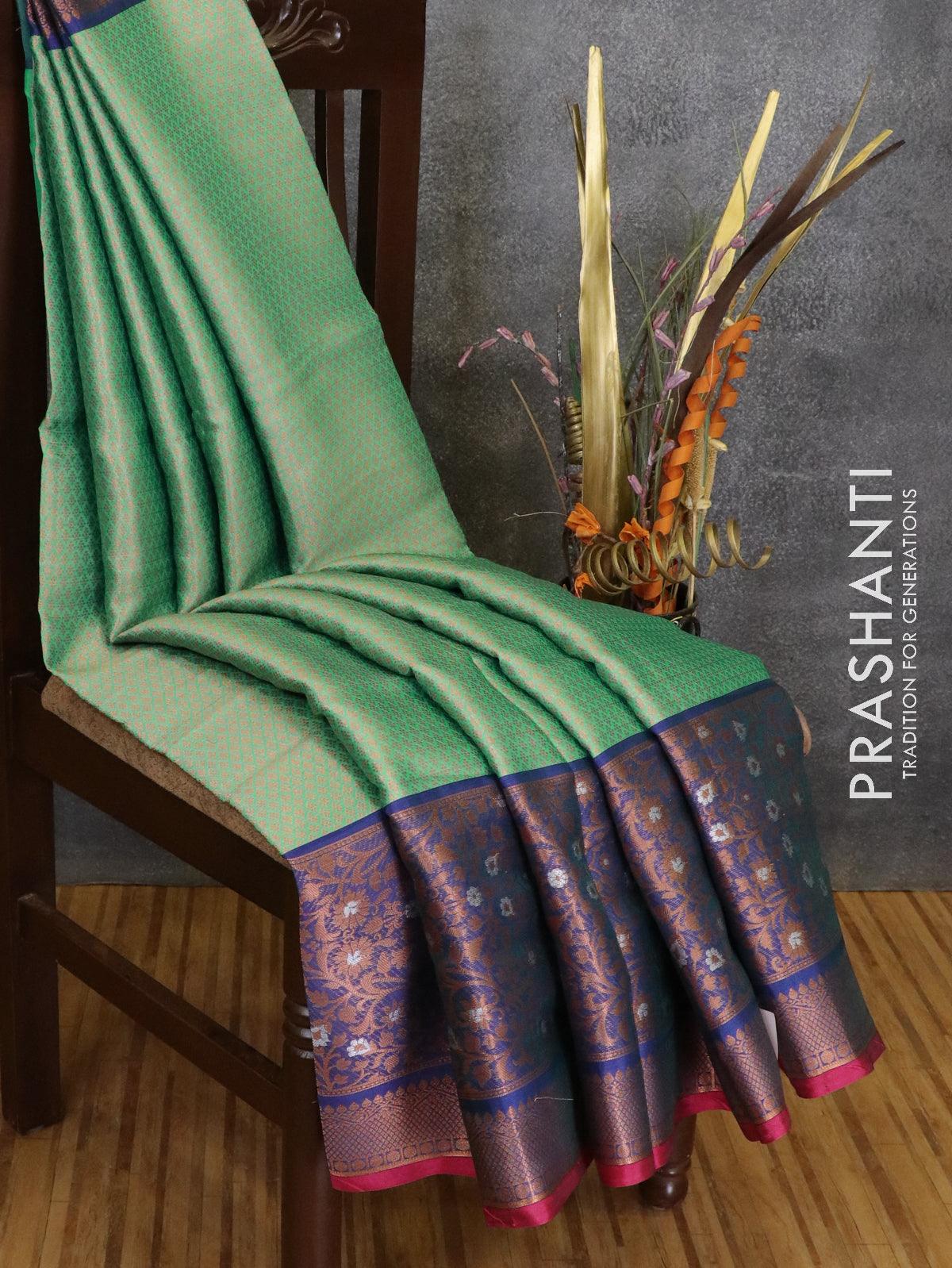 Banarasi kora saree teal green and blue with allover copper zari weaves and long copper zari woven border