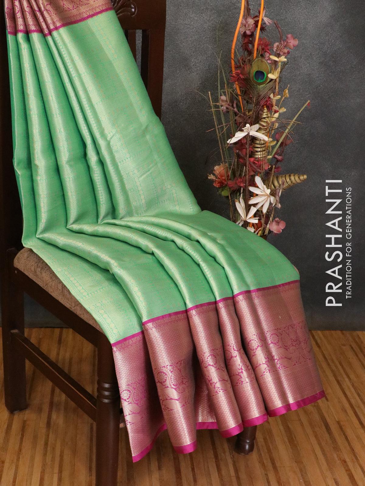 Banarasi kora saree teal green and magenta pink with allover zari weaves and long zari woven border