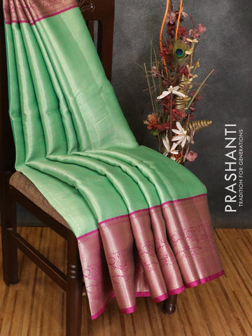 Banarasi kora saree teal green and magenta pink with allover zari weaves and long zari woven border