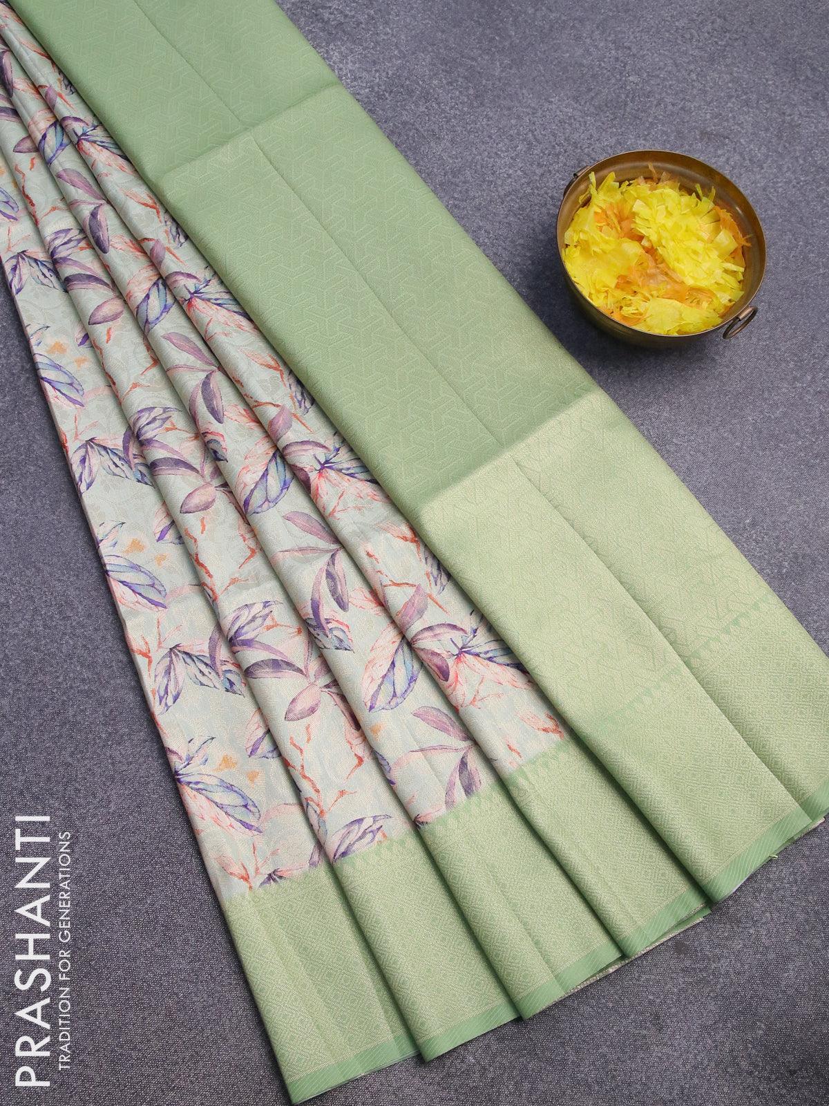 Banarasi softy silk saree pastel green shade and green with allover zari weaves & floral digital prints and zari woven border