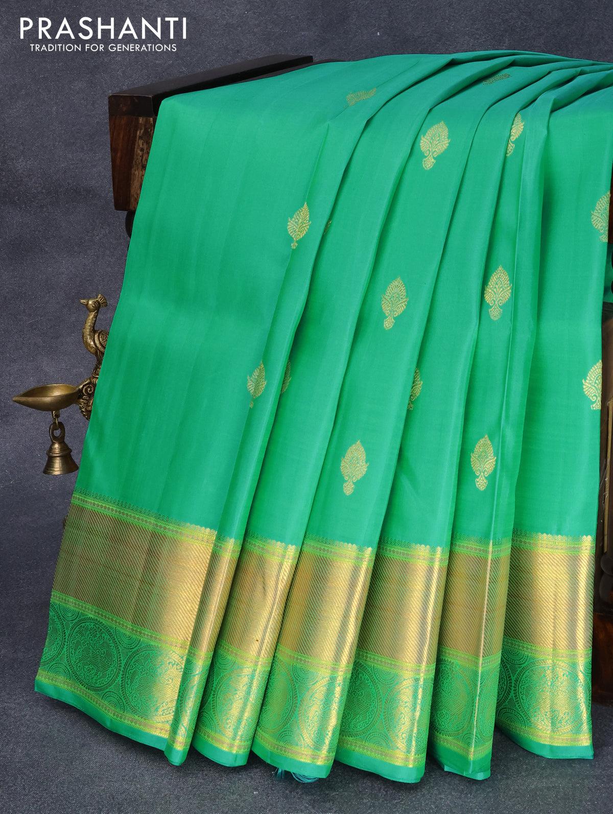 Pure kanjivaram silk saree dual shade of teal green with zari woven buttas and rich zari woven border Butta style