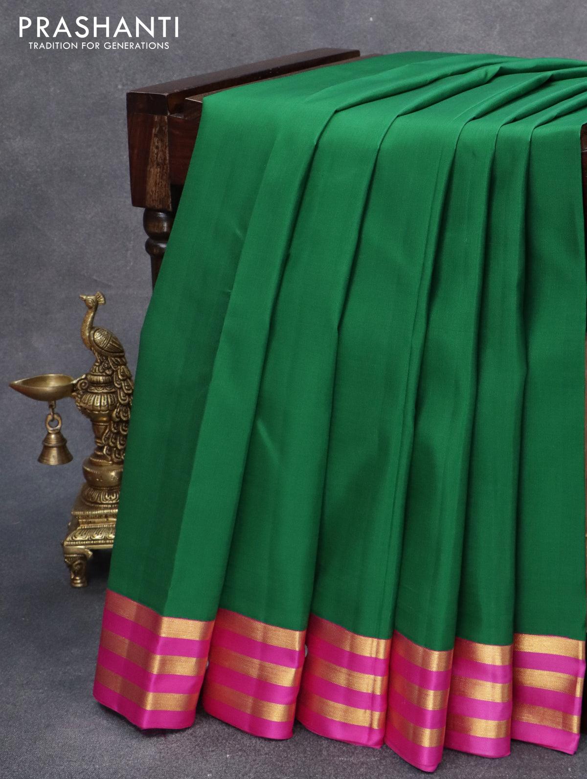 Pure Kanjivaram silk saree green and pink with plain body and zari woven border