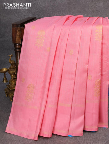 Pure kanjivaram silk saree light pink and cs blue with allover silver & gold zari stripe weaves & buttas and rettapet zari woven border