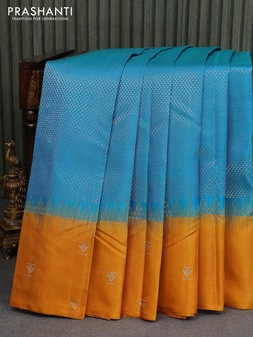 Pure soft silk saree cs blue and mustard yellow with allover silver zari woven geometric weaves and zari woven butta border