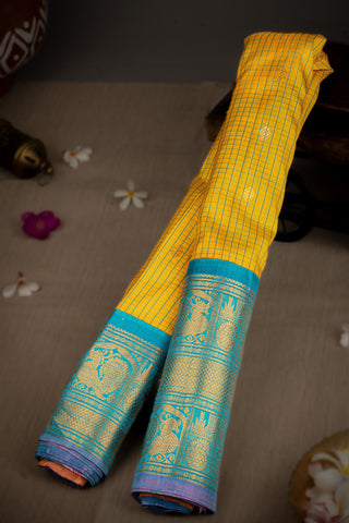 Varamahalakshmi Yellow & Sea Blue Gadwal Checks And Buttis Saree